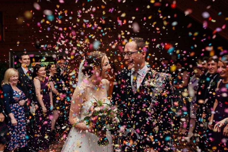 bride groom the cruin loch lomond just married colourful confetti throw