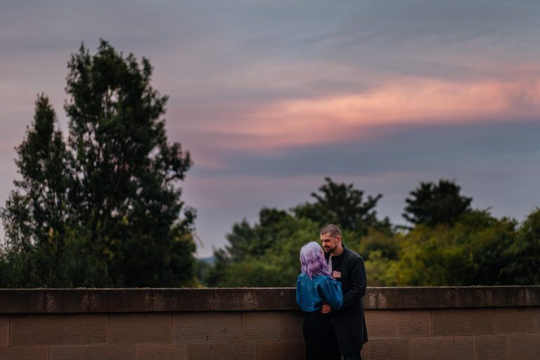 couples photos at sunset golden hour purple sky with purple haired girl